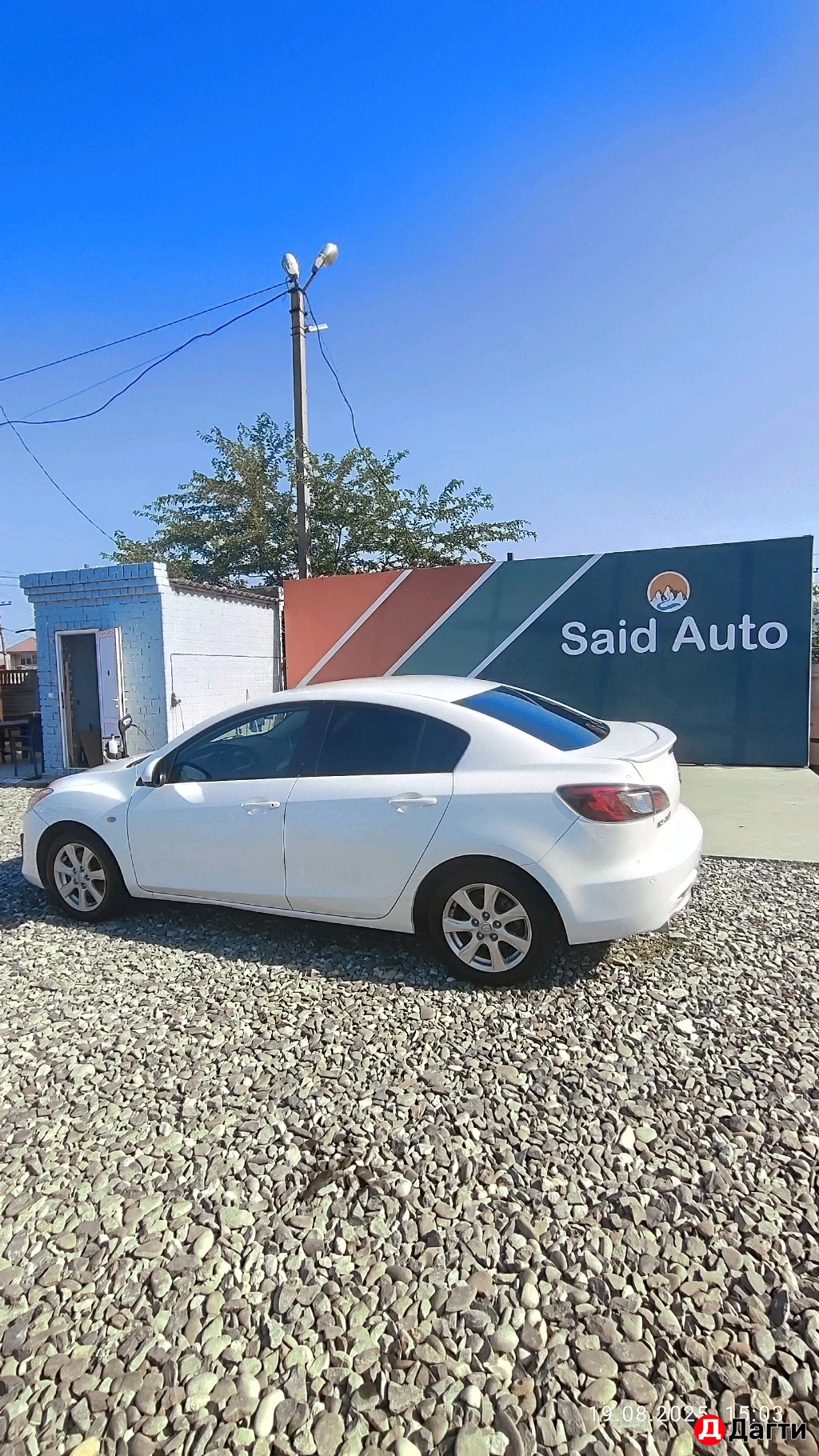 Mazda 3, 2011 года