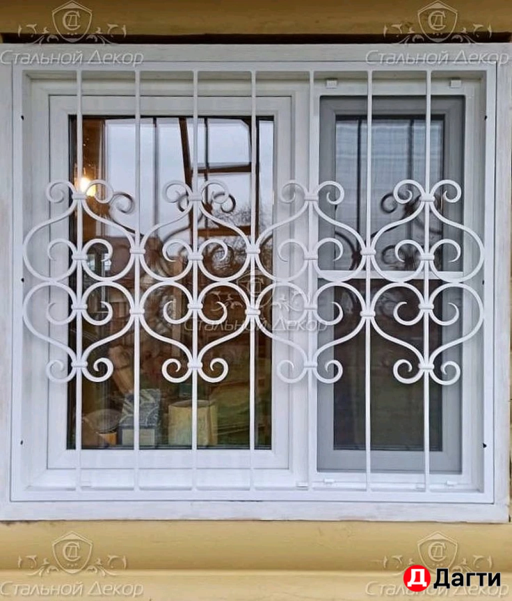 Окна обрамленные ковкой
