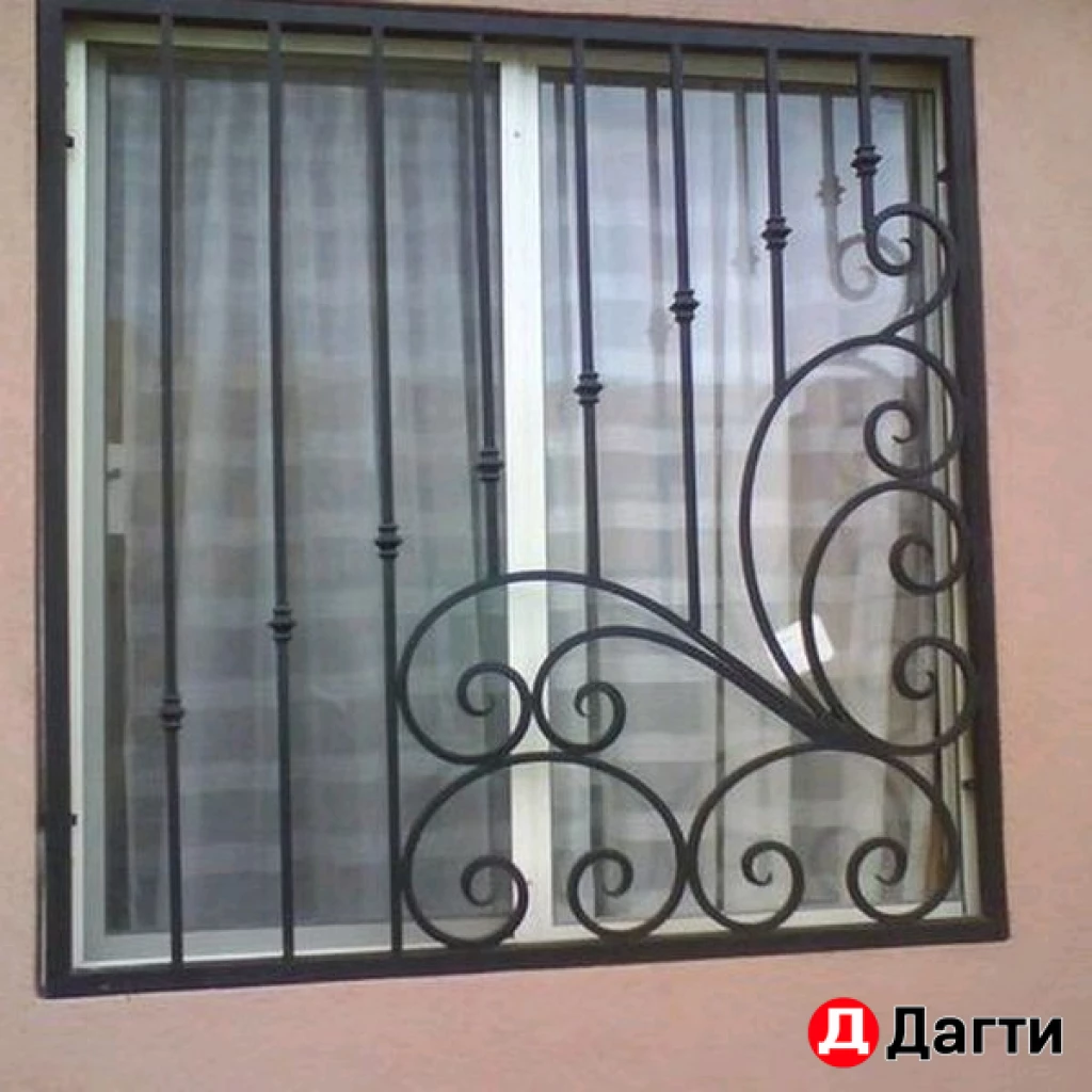 Окна обрамленные ковкой