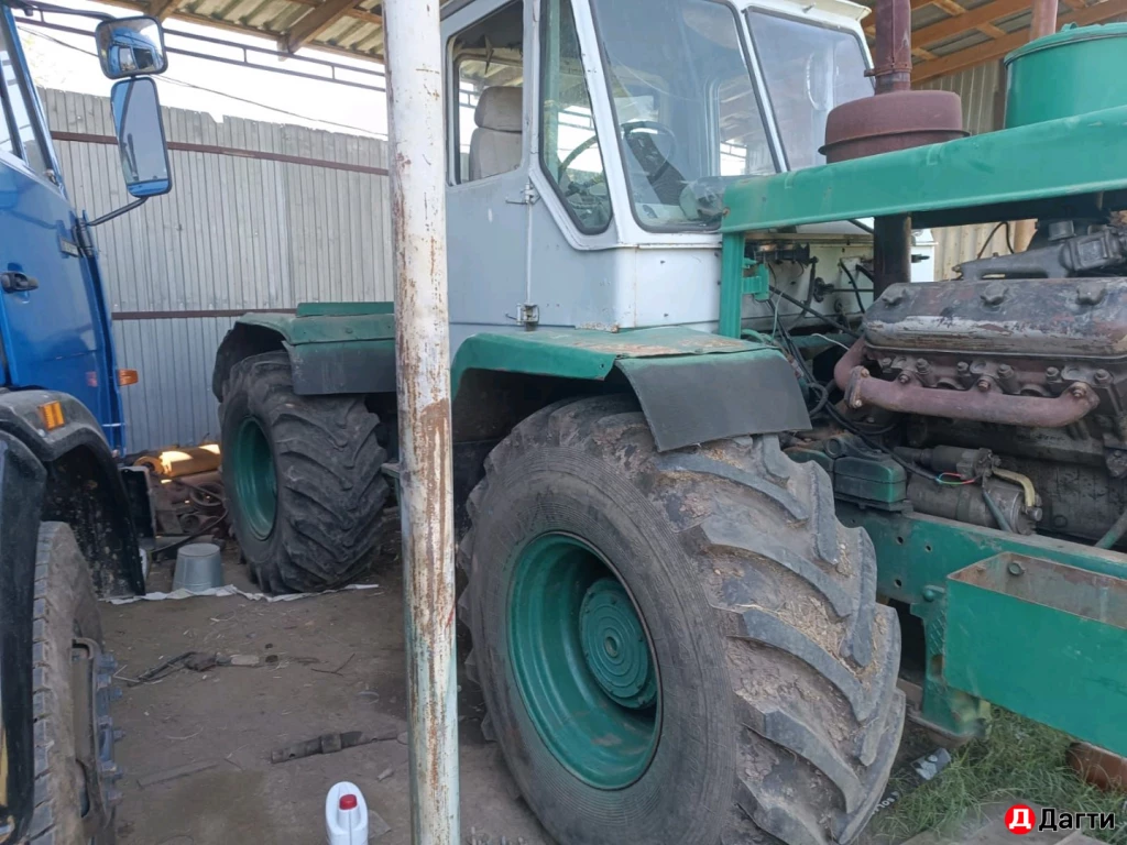 Трактор т150